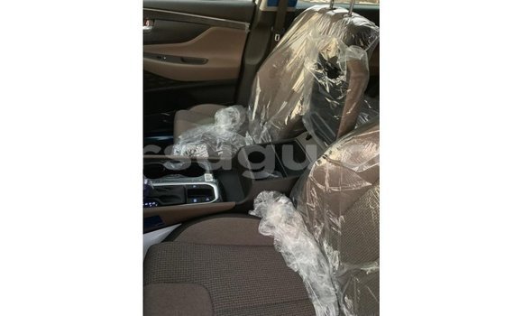 Sayi Imported Hyundai Santa Fe White Mota in Import - Dubai a Burkina Faso Sayi Imported Hyundai Santa Fe White Mota in Import - Dubai a Burkina Faso