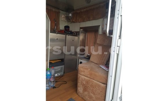 Acheter Import Voiture Kia Carens Blanc à Import - Dubai, Burkina-Faso Acheter Import Voiture Kia Carens Blanc à Import - Dubai, Burkina-Faso