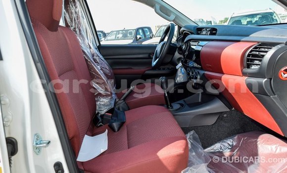 Buy Import Toyota Hilux White Car in Import - Dubai in Burkina Faso Buy Import Toyota Hilux White Car in Import - Dubai in Burkina Faso