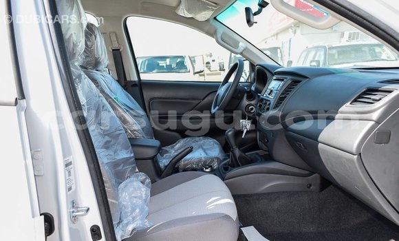 Buy Import Mitsubishi L200 White Car in Import - Dubai in Burkina Faso Buy Import Mitsubishi L200 White Car in Import - Dubai in Burkina Faso