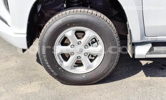 Buy Import Mitsubishi L200 White Car in Import - Dubai in Burkina Faso Buy Import Mitsubishi L200 White Car in Import - Dubai in Burkina Faso
