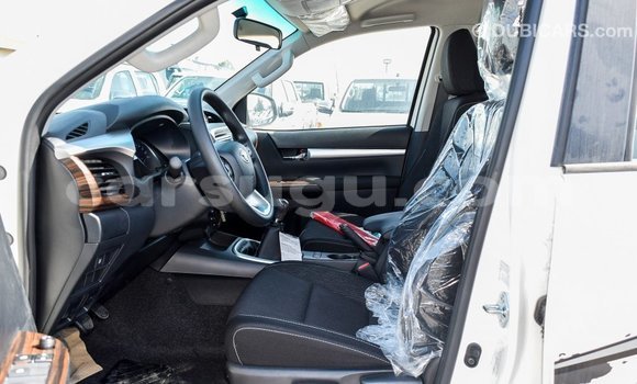 Buy Import Toyota Hilux White Car in Import - Dubai in Burkina Faso Buy Import Toyota Hilux White Car in Import - Dubai in Burkina Faso