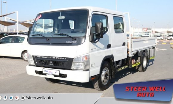 Sayi Imported Mitsubishi Carisma White Mota in Import - Dubai a Burkina Faso Sayi Imported Mitsubishi Carisma White Mota in Import - Dubai a Burkina Faso