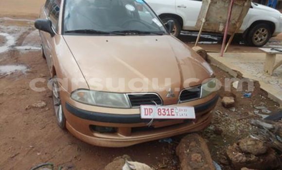 Sayi Sabo Mitsubishi Carisma Brown Mota in Ouagadougou a Burkina Faso