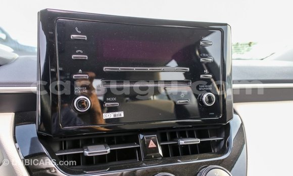 Acheter Import Voiture Toyota Corolla Blanc à Import - Dubai, Burkina-Faso Acheter Import Voiture Toyota Corolla Blanc à Import - Dubai, Burkina-Faso