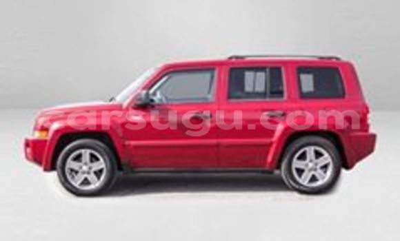 Sayi Sabo Jeep Patriot Red Mota in Ouagadougou a Burkina Faso