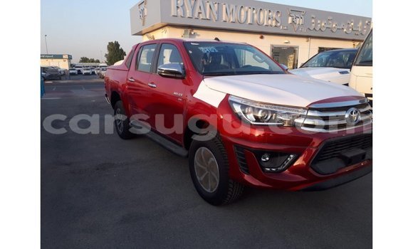 Sayi Imported Toyota Hilux Red Mota in Import - Dubai a Burkina Faso Sayi Imported Toyota Hilux Red Mota in Import - Dubai a Burkina Faso