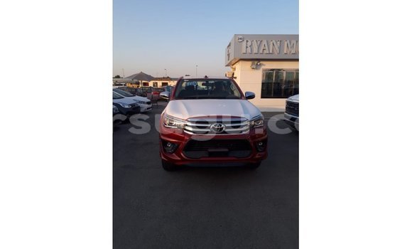 Sayi Imported Toyota Hilux Red Mota in Import - Dubai a Burkina Faso Sayi Imported Toyota Hilux Red Mota in Import - Dubai a Burkina Faso