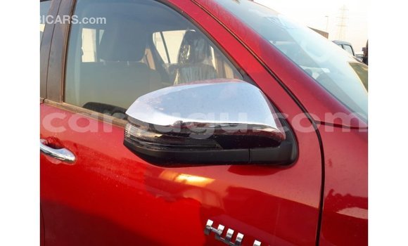 Sayi Imported Toyota Hilux Red Mota in Import - Dubai a Burkina Faso Sayi Imported Toyota Hilux Red Mota in Import - Dubai a Burkina Faso