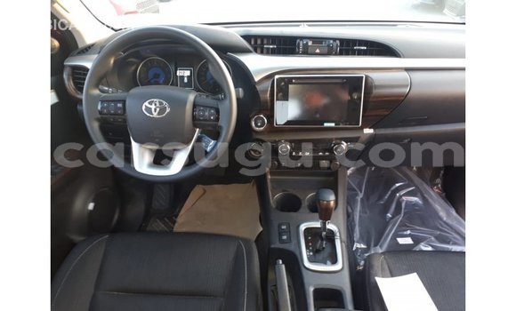 Sayi Imported Toyota Hilux Red Mota in Import - Dubai a Burkina Faso Sayi Imported Toyota Hilux Red Mota in Import - Dubai a Burkina Faso