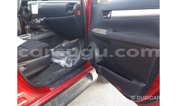 Sayi Imported Toyota Hilux Red Mota in Import - Dubai a Burkina Faso Sayi Imported Toyota Hilux Red Mota in Import - Dubai a Burkina Faso