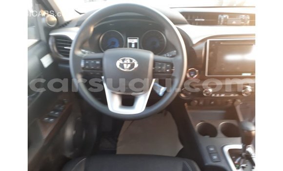 Sayi Imported Toyota Hilux Red Mota in Import - Dubai a Burkina Faso Sayi Imported Toyota Hilux Red Mota in Import - Dubai a Burkina Faso
