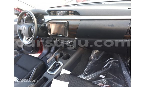 Sayi Imported Toyota Hilux Red Mota in Import - Dubai a Burkina Faso Sayi Imported Toyota Hilux Red Mota in Import - Dubai a Burkina Faso