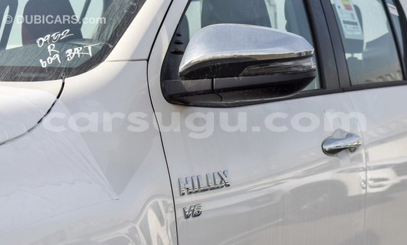 Sayi Imported Toyota Hilux White Mota in Import - Dubai a Burkina Faso Sayi Imported Toyota Hilux White Mota in Import - Dubai a Burkina Faso