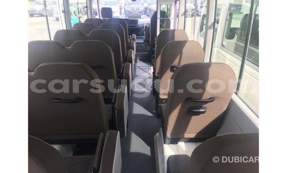 Sayi Imported Toyota Coaster White Mota in Import - Dubai a Burkina Faso Sayi Imported Toyota Coaster White Mota in Import - Dubai a Burkina Faso