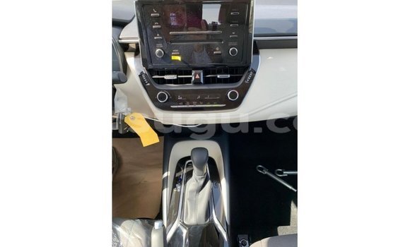 Acheter Import Voiture Toyota Corolla Blanc à Import - Dubai, Burkina-Faso Acheter Import Voiture Toyota Corolla Blanc à Import - Dubai, Burkina-Faso