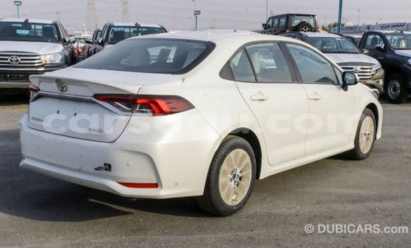 Buy Import Toyota Corolla White Car in Import - Dubai in Burkina Faso Buy Import Toyota Corolla White Car in Import - Dubai in Burkina Faso