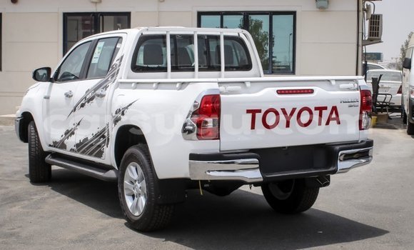 Buy Import Toyota Hilux White Car in Import - Dubai in Burkina Faso Buy Import Toyota Hilux White Car in Import - Dubai in Burkina Faso