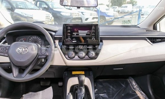 Sayi Imported Toyota Corolla White Mota in Import - Dubai a Burkina Faso Sayi Imported Toyota Corolla White Mota in Import - Dubai a Burkina Faso