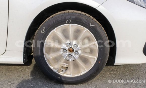 Sayi Imported Toyota Corolla White Mota in Import - Dubai a Burkina Faso Sayi Imported Toyota Corolla White Mota in Import - Dubai a Burkina Faso