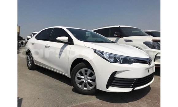 Sayi Imported Toyota Corolla White Mota in Import - Dubai a Burkina Faso Sayi Imported Toyota Corolla White Mota in Import - Dubai a Burkina Faso