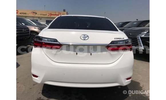 Sayi Imported Toyota Corolla White Mota in Import - Dubai a Burkina Faso Sayi Imported Toyota Corolla White Mota in Import - Dubai a Burkina Faso