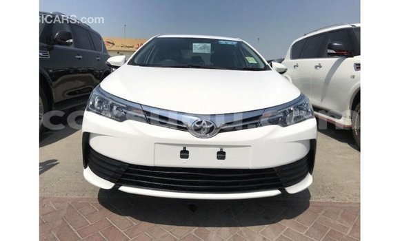 Sayi Imported Toyota Corolla White Mota in Import - Dubai a Burkina Faso Sayi Imported Toyota Corolla White Mota in Import - Dubai a Burkina Faso