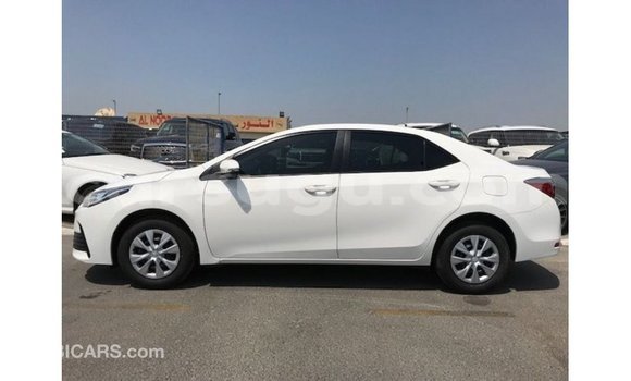 Sayi Imported Toyota Corolla White Mota in Import - Dubai a Burkina Faso Sayi Imported Toyota Corolla White Mota in Import - Dubai a Burkina Faso
