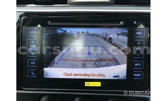 Sayi Imported Toyota Corolla White Mota in Import - Dubai a Burkina Faso Sayi Imported Toyota Corolla White Mota in Import - Dubai a Burkina Faso