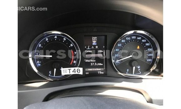 Sayi Imported Toyota Corolla White Mota in Import - Dubai a Burkina Faso Sayi Imported Toyota Corolla White Mota in Import - Dubai a Burkina Faso