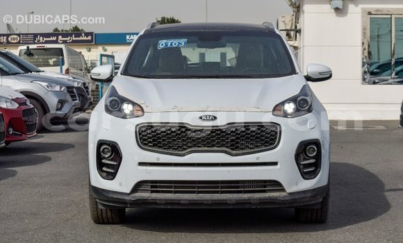 Sayi Imported Kia Sportage White Mota in Import - Dubai a Burkina Faso Sayi Imported Kia Sportage White Mota in Import - Dubai a Burkina Faso