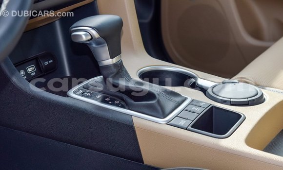 Sayi Imported Kia Sportage White Mota in Import - Dubai a Burkina Faso Sayi Imported Kia Sportage White Mota in Import - Dubai a Burkina Faso