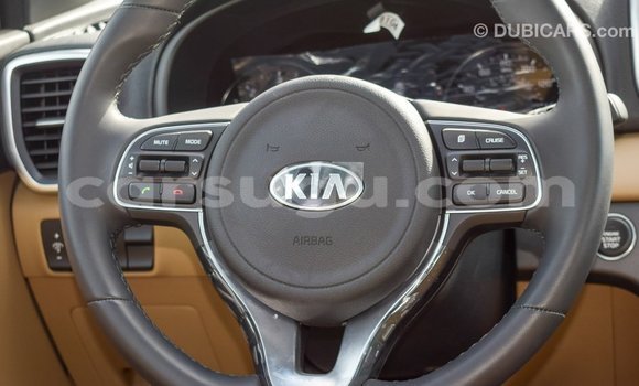 Sayi Imported Kia Sportage White Mota in Import - Dubai a Burkina Faso Sayi Imported Kia Sportage White Mota in Import - Dubai a Burkina Faso