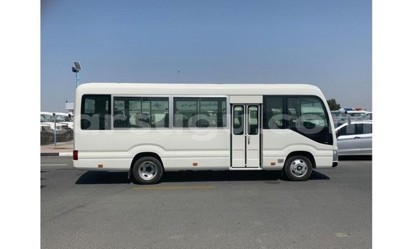 Sayi Imported Toyota Coaster White Mota in Import - Dubai a Burkina Faso Sayi Imported Toyota Coaster White Mota in Import - Dubai a Burkina Faso