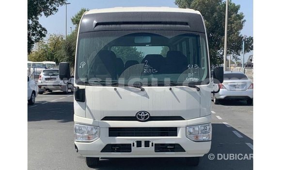 Sayi Imported Toyota Coaster White Mota in Import - Dubai a Burkina Faso Sayi Imported Toyota Coaster White Mota in Import - Dubai a Burkina Faso