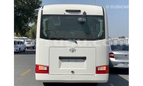 Acheter Import Voiture Toyota Coaster Blanc à Import - Dubai, Burkina-Faso Acheter Import Voiture Toyota Coaster Blanc à Import - Dubai, Burkina-Faso