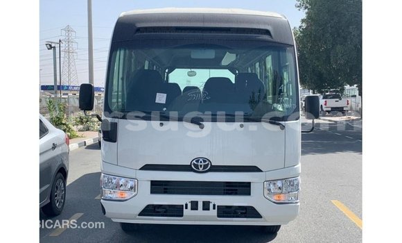 Acheter Import Voiture Toyota Coaster Blanc à Import - Dubai, Burkina-Faso Acheter Import Voiture Toyota Coaster Blanc à Import - Dubai, Burkina-Faso