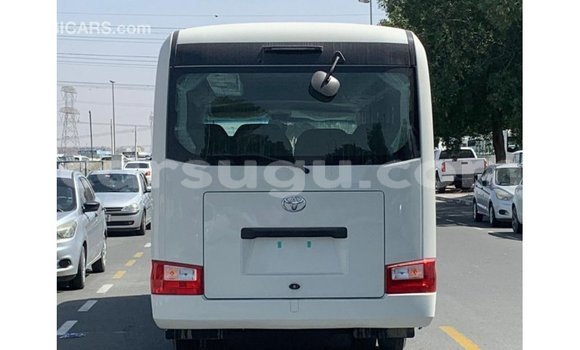 Acheter Import Voiture Toyota Coaster Blanc à Import - Dubai, Burkina-Faso Acheter Import Voiture Toyota Coaster Blanc à Import - Dubai, Burkina-Faso