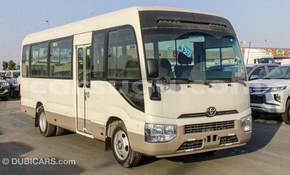 Acheter Import Voiture Toyota Coaster Blanc à Import - Dubai, Burkina-Faso Acheter Import Voiture Toyota Coaster Blanc à Import - Dubai, Burkina-Faso