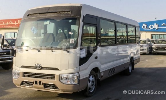 Acheter Import Voiture Toyota Coaster Blanc à Import - Dubai, Burkina-Faso Acheter Import Voiture Toyota Coaster Blanc à Import - Dubai, Burkina-Faso