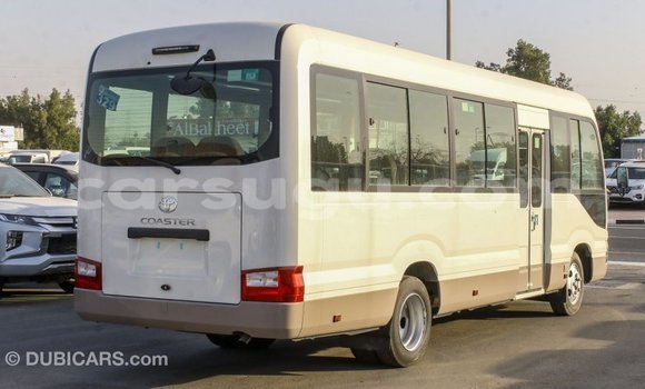 Acheter Import Voiture Toyota Coaster Blanc à Import - Dubai, Burkina-Faso Acheter Import Voiture Toyota Coaster Blanc à Import - Dubai, Burkina-Faso