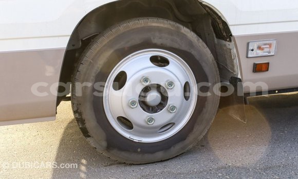 Acheter Import Voiture Toyota Coaster Blanc à Import - Dubai, Burkina-Faso Acheter Import Voiture Toyota Coaster Blanc à Import - Dubai, Burkina-Faso