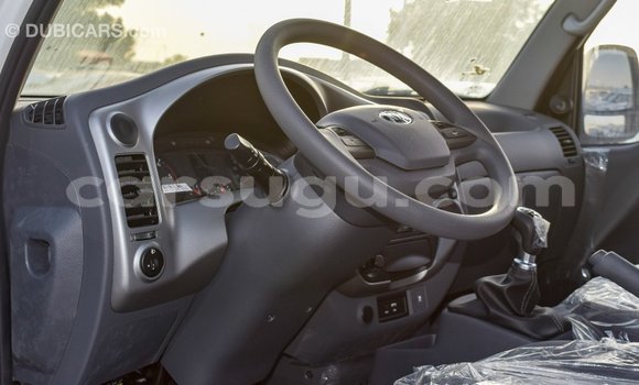 Sayi Imported Kia Carens White Mota in Import - Dubai a Burkina Faso Sayi Imported Kia Carens White Mota in Import - Dubai a Burkina Faso