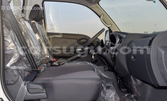 Sayi Imported Kia Carens White Mota in Import - Dubai a Burkina Faso Sayi Imported Kia Carens White Mota in Import - Dubai a Burkina Faso