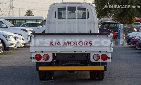 Sayi Imported Kia Carens White Mota in Import - Dubai a Burkina Faso Sayi Imported Kia Carens White Mota in Import - Dubai a Burkina Faso