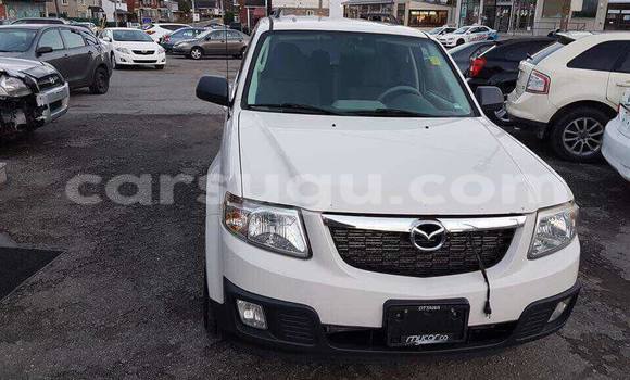 Buy New Mazda Tribute White Car in Ouagadougou in Burkina Faso Buy New Mazda Tribute White Car in Ouagadougou in Burkina Faso
