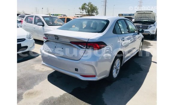 Sayi Imported Toyota Corolla White Mota in Import - Dubai a Burkina Faso Sayi Imported Toyota Corolla White Mota in Import - Dubai a Burkina Faso