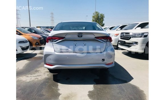Sayi Imported Toyota Corolla White Mota in Import - Dubai a Burkina Faso Sayi Imported Toyota Corolla White Mota in Import - Dubai a Burkina Faso