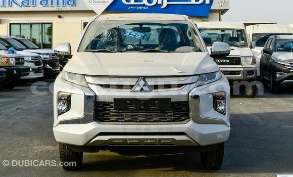 Acheter Import Voiture Mitsubishi L200 Blanc à Import - Dubai, Burkina-Faso Acheter Import Voiture Mitsubishi L200 Blanc à Import - Dubai, Burkina-Faso
