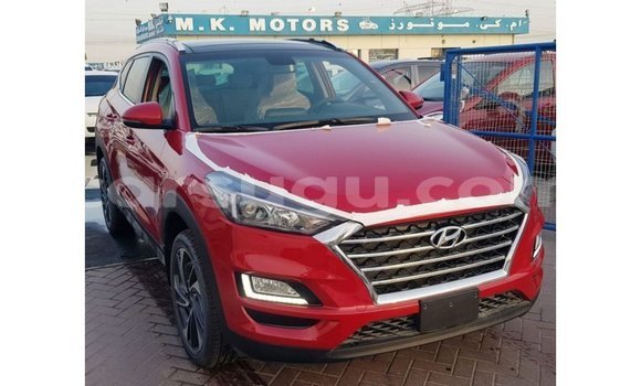 Sayi Imported Hyundai Tucson Red Mota in Import - Dubai a Burkina Faso Sayi Imported Hyundai Tucson Red Mota in Import - Dubai a Burkina Faso